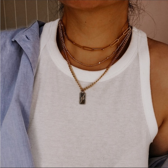 Gucci Jewelry - Authentic Gucci Charm, updated with gold coated chains.